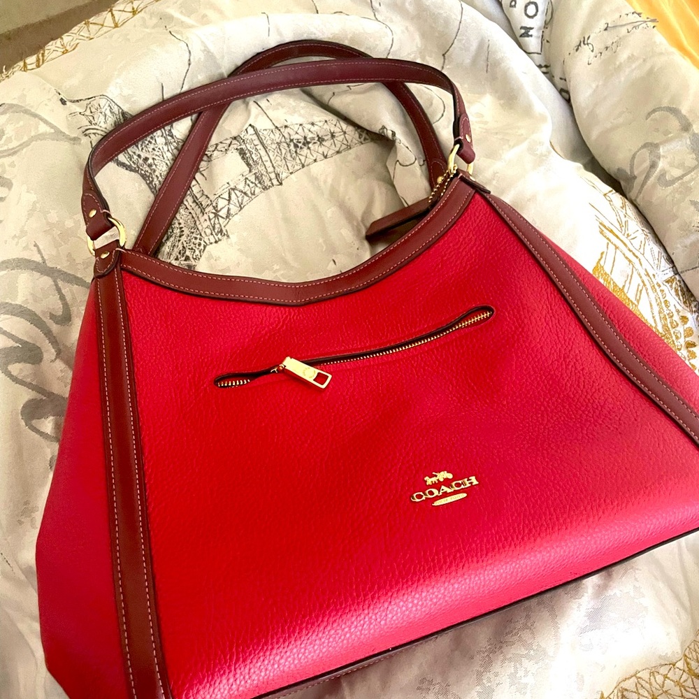 Coach Bag with matching clutch wallet.